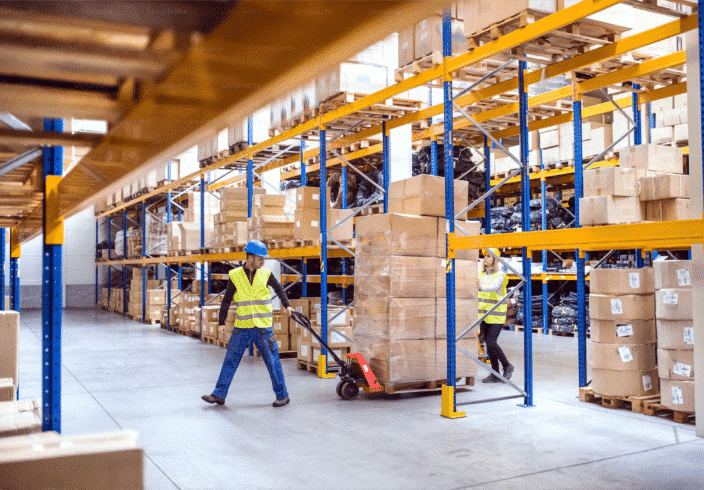 Warehouse racks and warehouse worker
