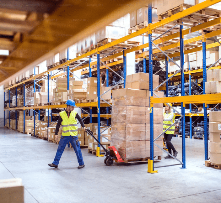Warehouse racks and warehouse worker
